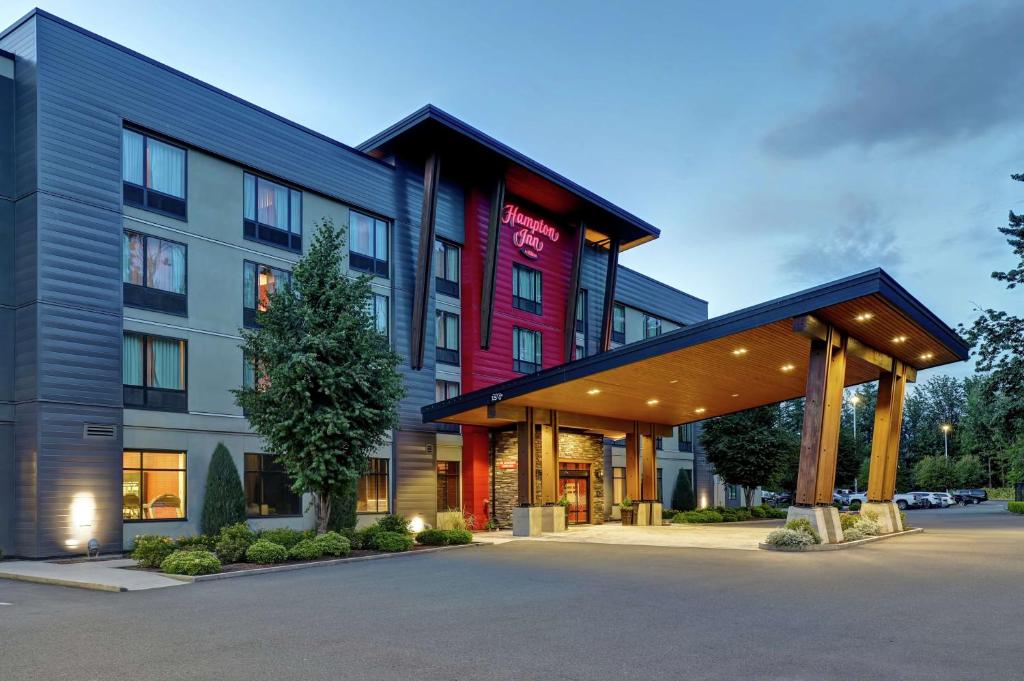 a rendering of a hotel with a building at Hampton Inn by Hilton Chilliwack in Chilliwack