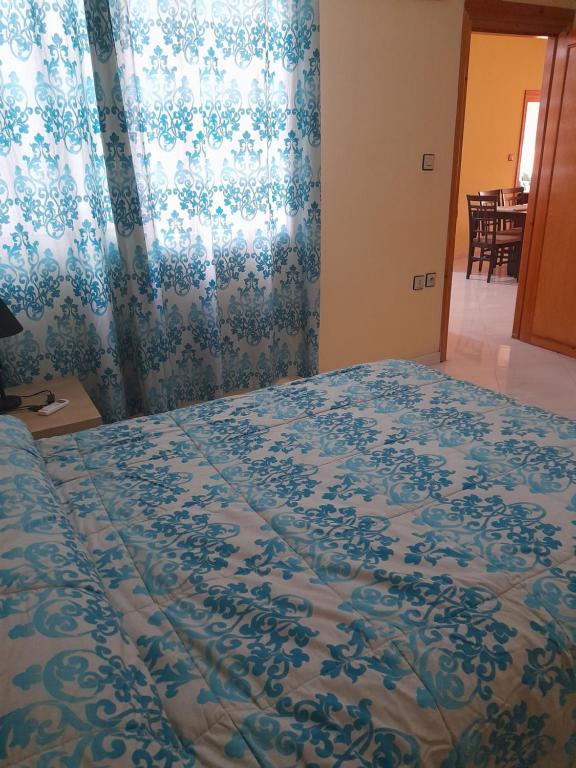 Postel nebo postele na pokoji v ubytování Ajdir
