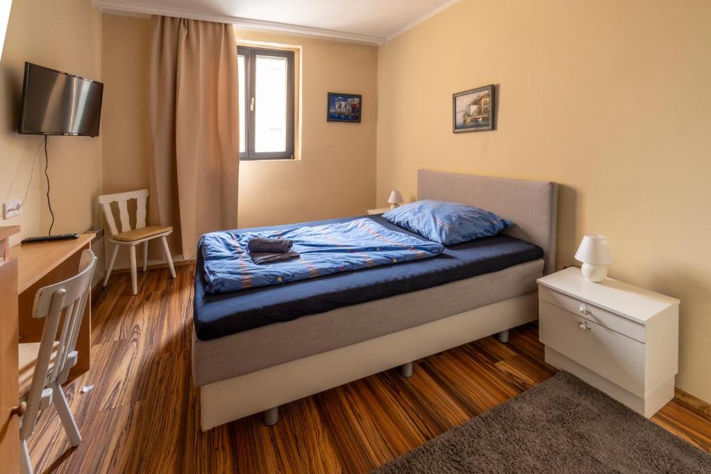 Postel nebo postele na pokoji v ubytování Máté Pension