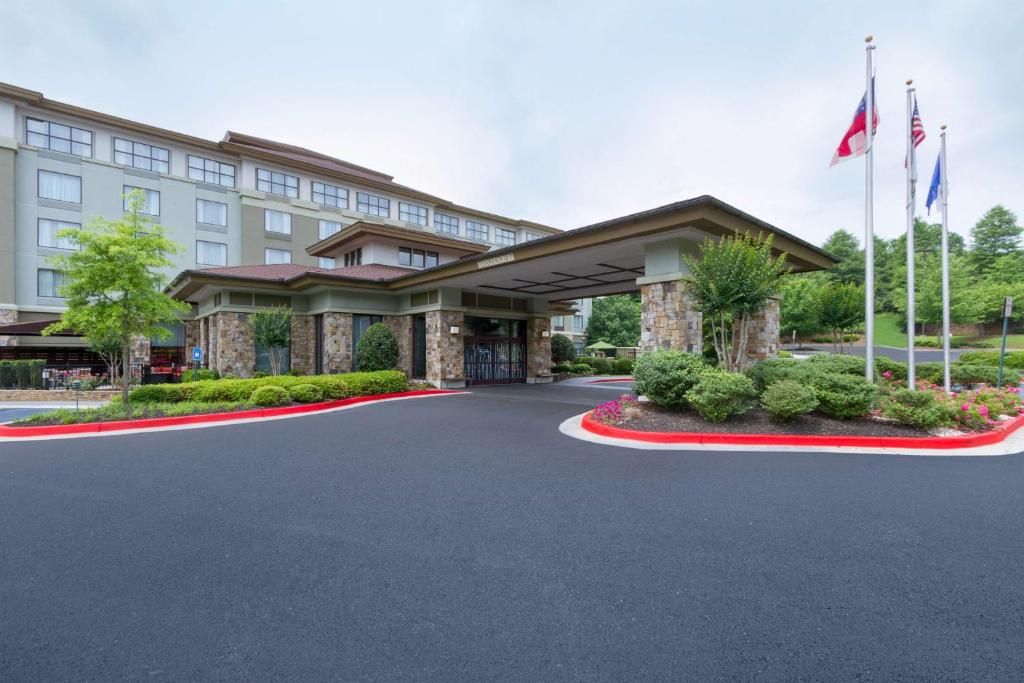 eine Darstellung der Vorderseite eines Hotels in der Unterkunft Hilton Garden Inn Atlanta Marietta in Atlanta