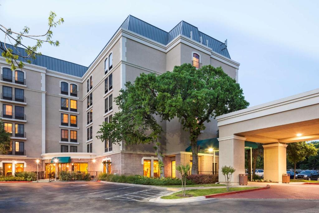 a rendering of the front of a building at DoubleTree by Hilton Austin-University Area in Austin