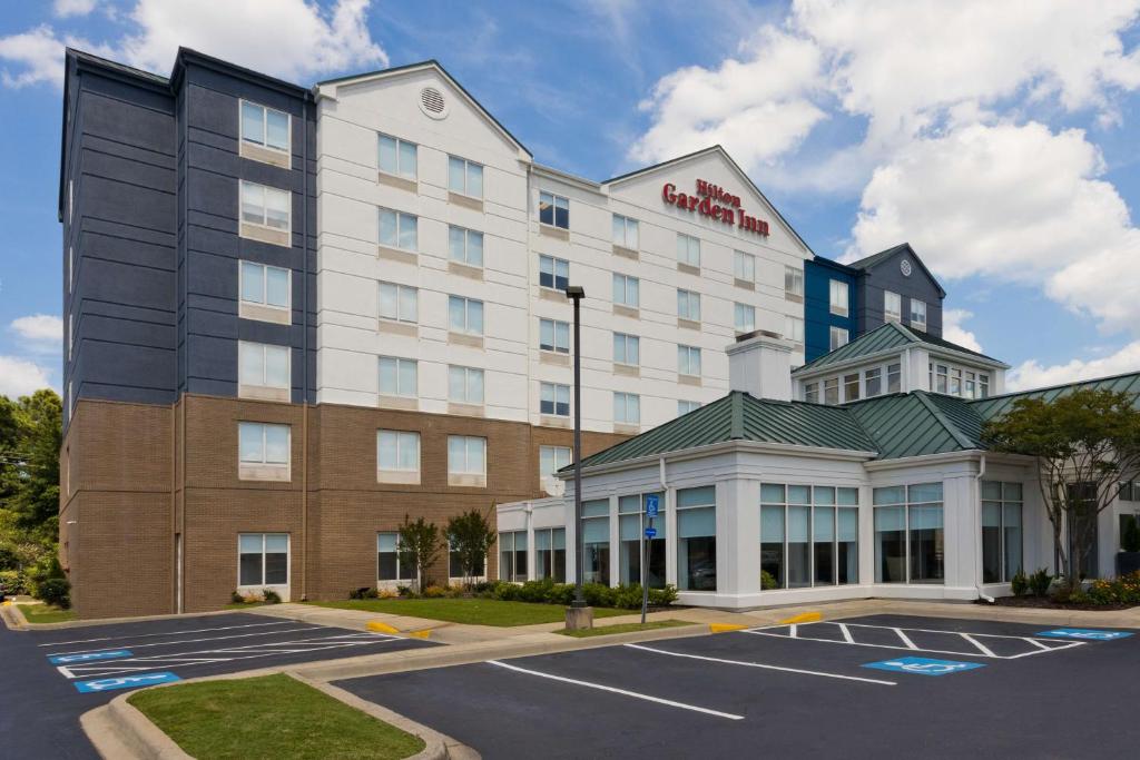 a rendering of a hotel with a parking lot at Hilton Garden Inn Birmingham/Lakeshore Drive in Birmingham