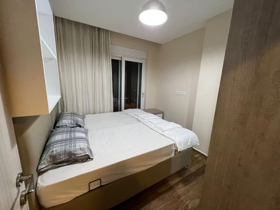 Postel nebo postele na pokoji v ubytování Ferah, Konyaaltı kumsalına yakın, merkezi konum '15'