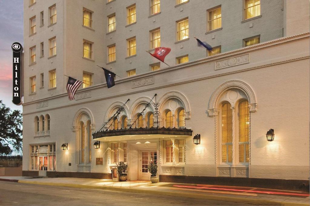 a building with a heart on the side of it at Hilton Baton Rouge Capitol Center in Baton Rouge