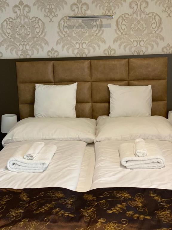 Postel nebo postele na pokoji v ubytování Blueline Motel