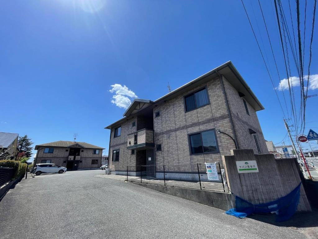 a building on the side of a street at Sapan Hasegawa - Vacation STAY 14809 in Kitakyushu