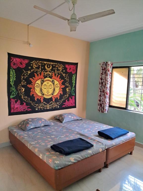 Postel nebo postele na pokoji v ubytování Bageecha B&B-Jal