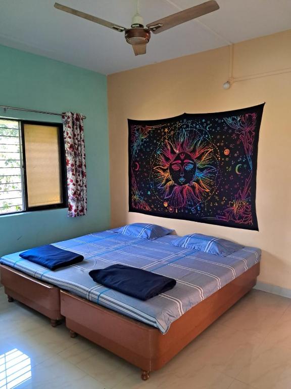 Postel nebo postele na pokoji v ubytování Bageecha B&B-Jal