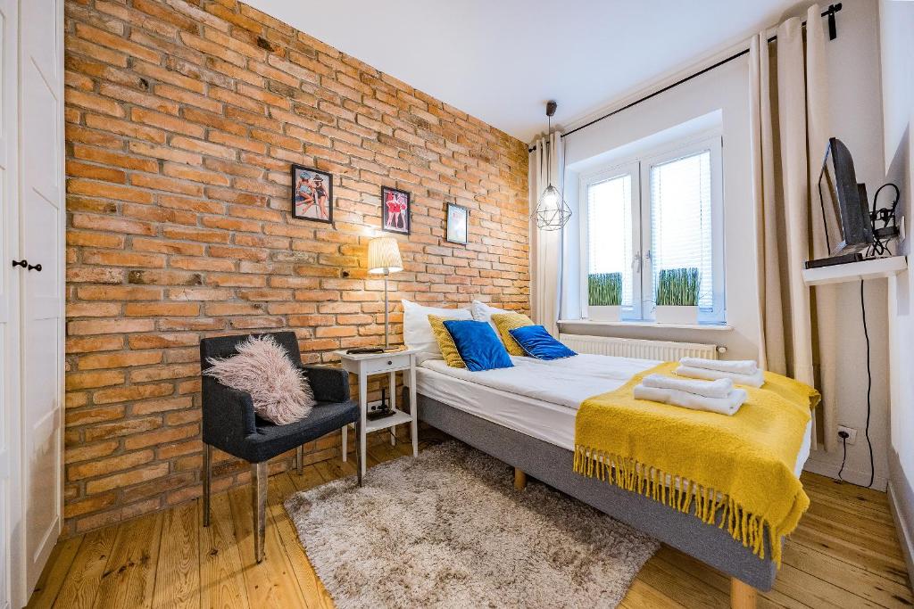 Postel nebo postele na pokoji v ubytování Pomorskie Apartamenty Enter House