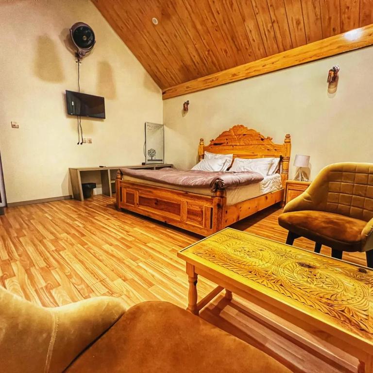 Postel nebo postele na pokoji v ubytování Oasis Resort