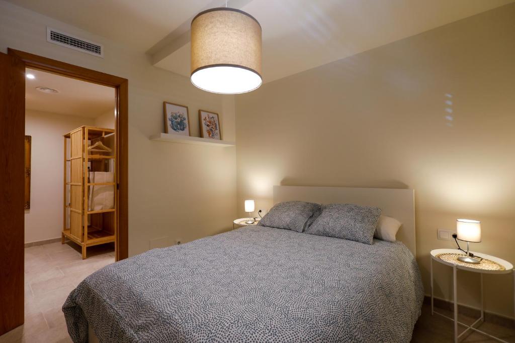 A bed or beds in a room at Mediterranean City