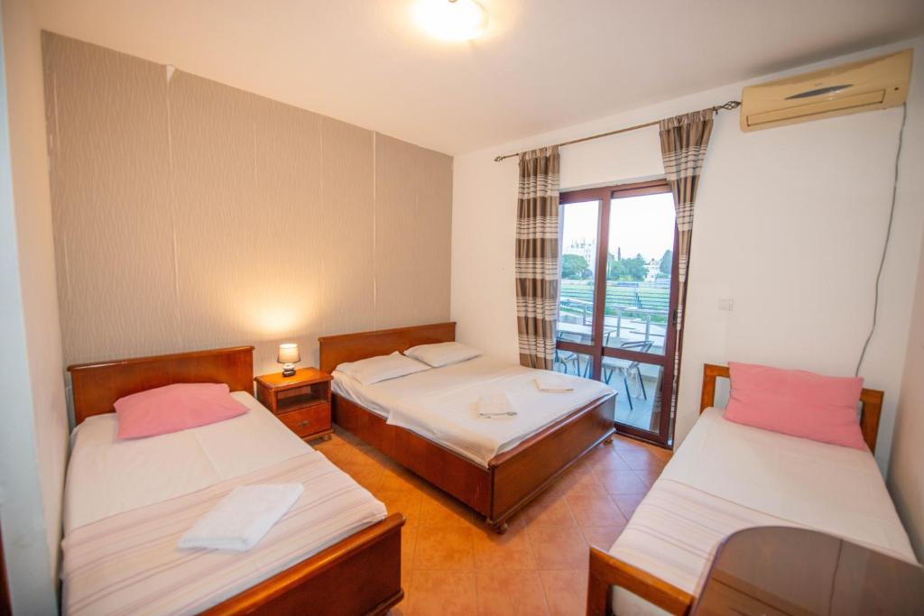 Postel nebo postele na pokoji v ubytování Katana