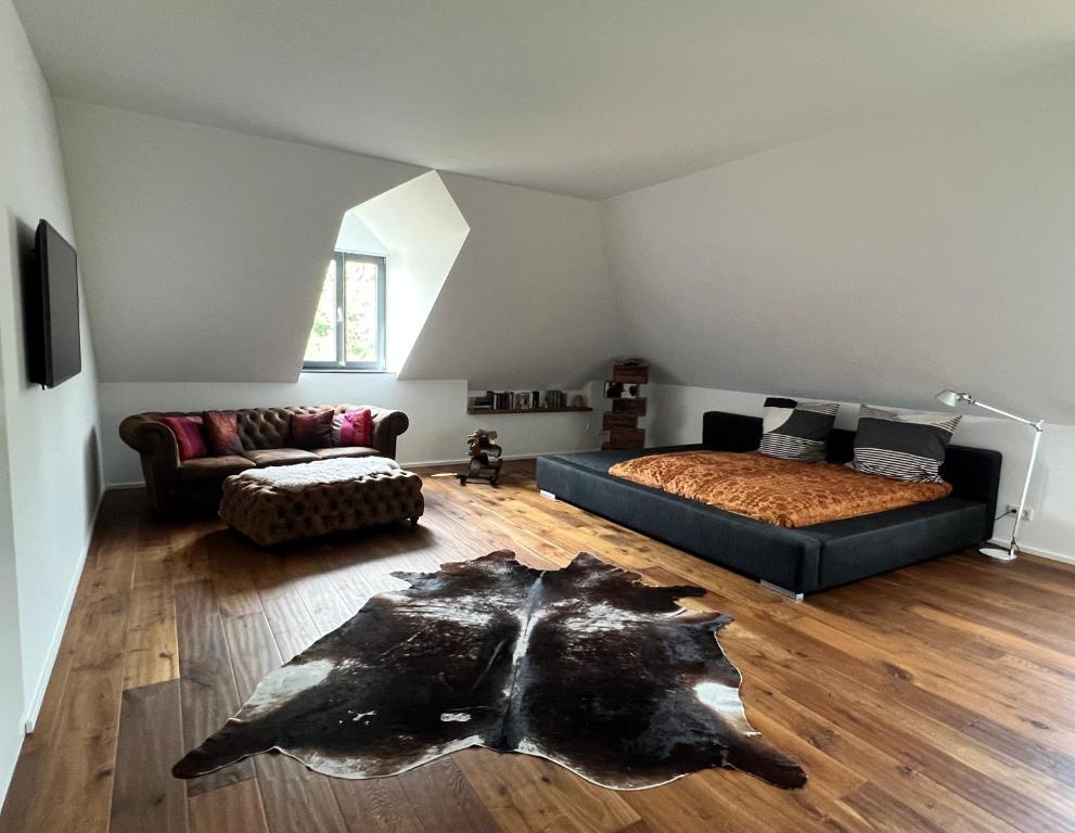 Postel nebo postele na pokoji v ubytování Trierer Heide - Architektur zum wohl fühlen