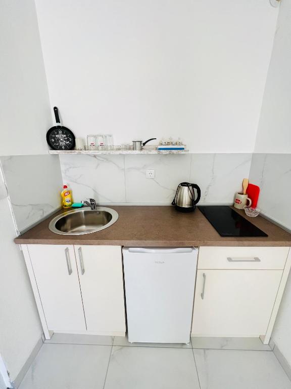 Kuhinja ili čajna kuhinja u objektu Apartments Mia Patria