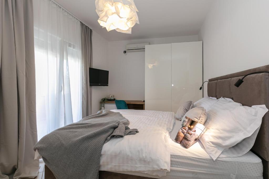 Postel nebo postele na pokoji v ubytování Pansion Gaspar