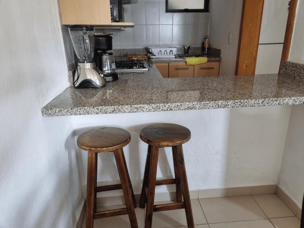 Kuchyň nebo kuchyňský kout v ubytování Hotel La Ribereña