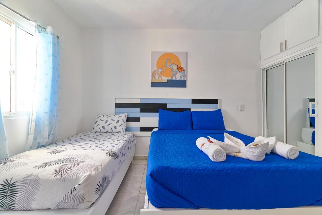 Postel nebo postele na pokoji v ubytování Costa Love Hotel Aeropuerto