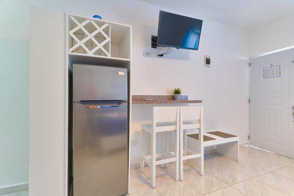 Kuchyň nebo kuchyňský kout v ubytování Costa Love Hotel Aeropuerto