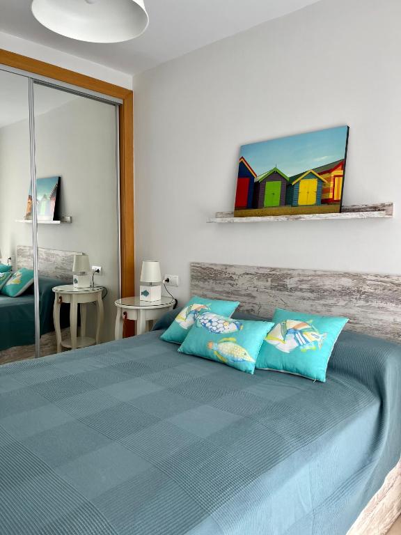 Postel nebo postele na pokoji v ubytování ÁTICO Paraíso Beach con piscina privada