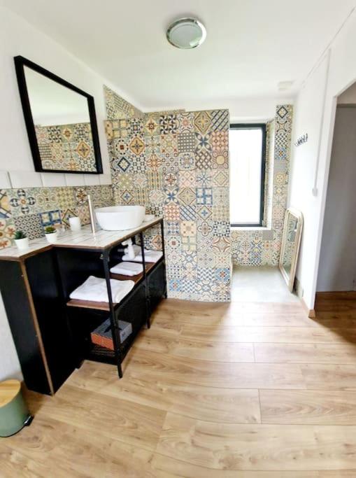 Koupelna v ubytování Maisonnette du Foirail