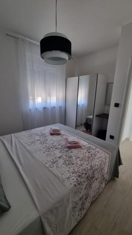 Postel nebo postele na pokoji v ubytování Gabi