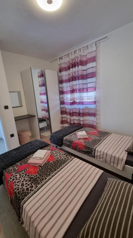 Postel nebo postele na pokoji v ubytování Gabi