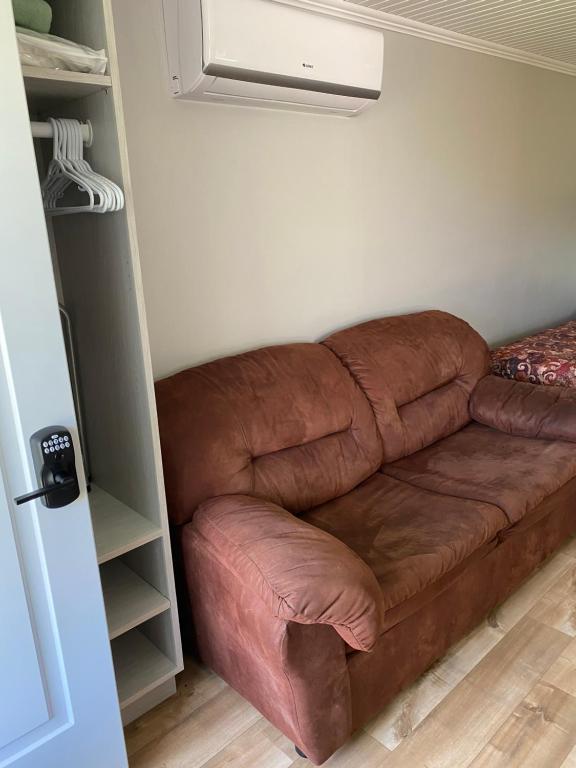 Posezení v ubytování Chalets Glenn