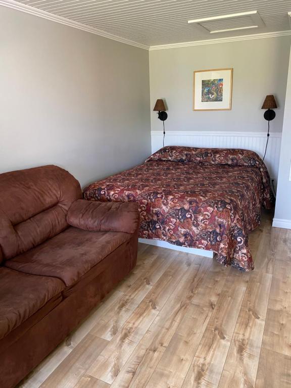 Postel nebo postele na pokoji v ubytování Chalets Glenn
