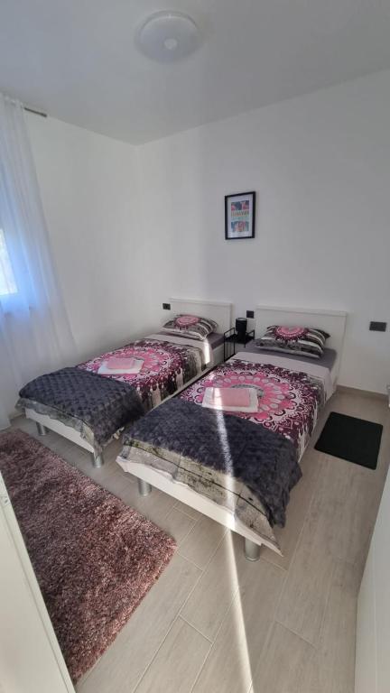 Postel nebo postele na pokoji v ubytování Gabi