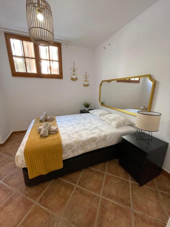 Postel nebo postele na pokoji v ubytování UIM Planta baja Canovas del Castillo, PLAYA WIFI