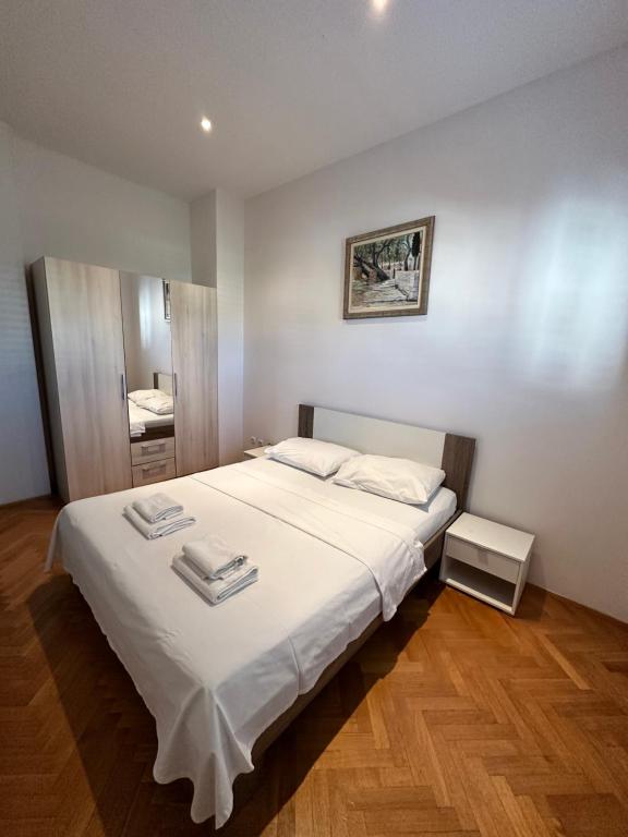 Posteľ alebo postele v izbe v ubytovaní Apartments Villa Ohana