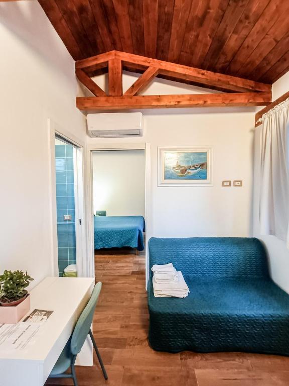 Postel nebo postele na pokoji v ubytování Il Giunco B&B