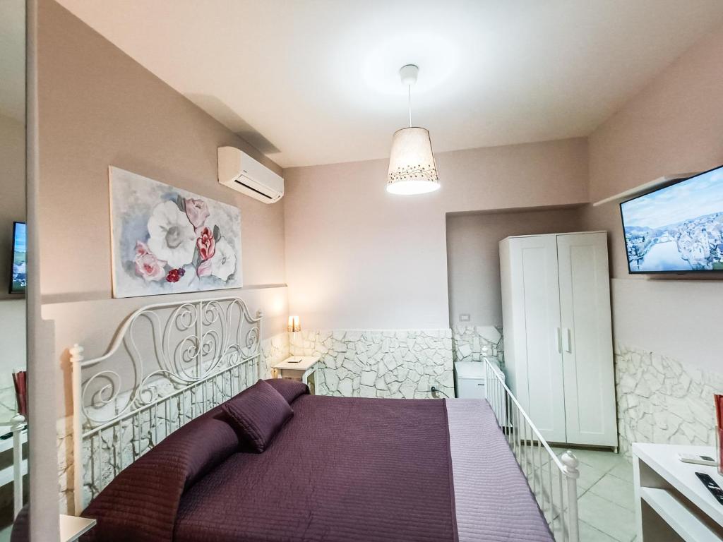 Postel nebo postele na pokoji v ubytování Il Giunco B&B