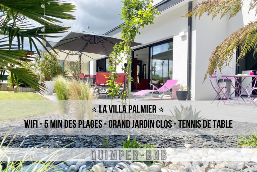 ein Haus mit einem Schild, das den Villa-Pallilli-Maler mit mm weniger liest in der Unterkunft LA VILLA PALMIER - Plages à 5 min in Concarneau