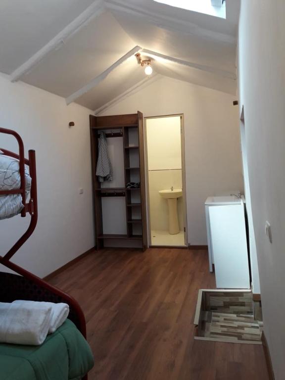 Postel nebo postele na pokoji v ubytování Casa Turistica Las Tunas