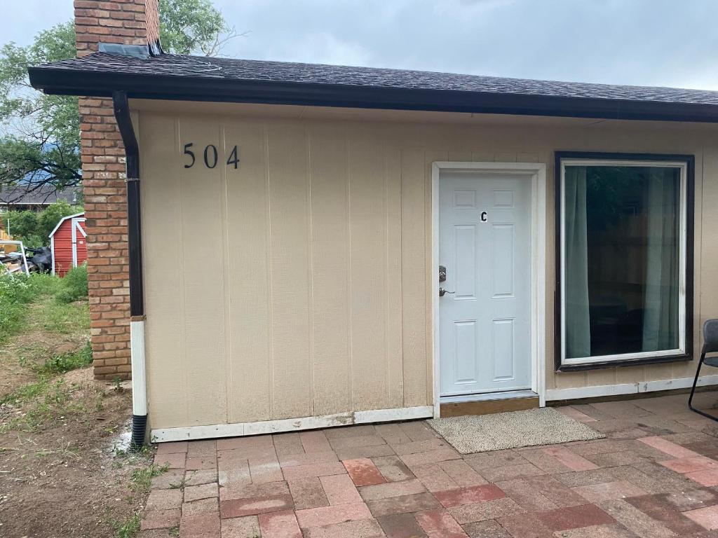 a garage with the number on it at 2-bedroom near hwy. 24 & I-25 in Colorado Springs