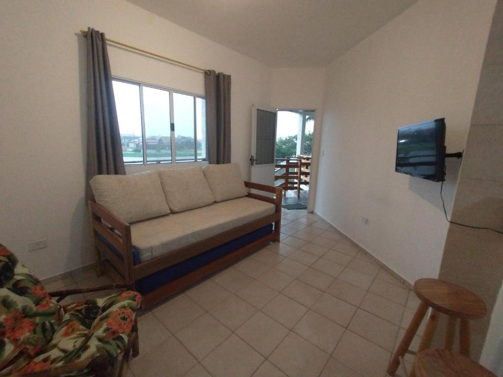 TV a/nebo společenská místnost v ubytování Recanto da Lagoa Flat