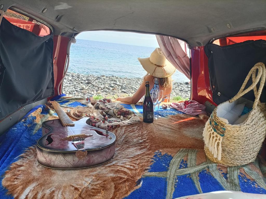 a person sitting in the back of a van at Discovery Tenerife II in San Miguel de Abona