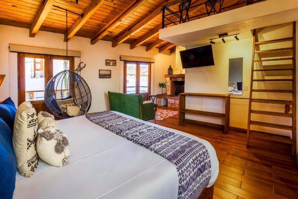 Postel nebo postele na pokoji v ubytování Hotel Kali