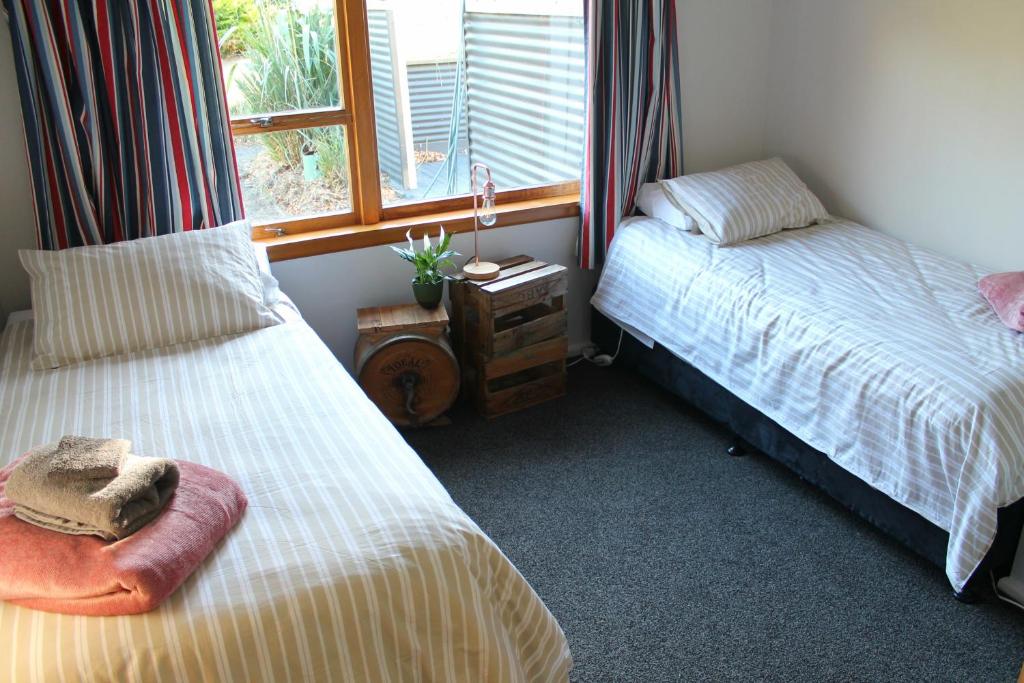 Postel nebo postele na pokoji v ubytování Bauchops Hill Station Farmstay