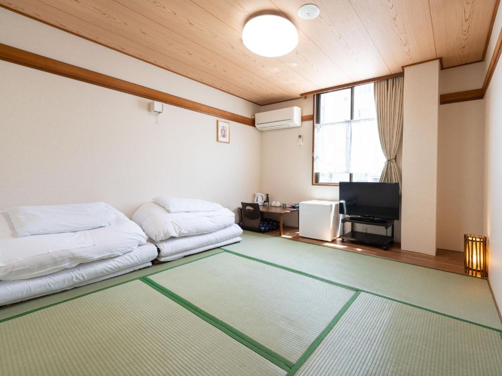 Posezení v ubytování Travel Inn Kofu