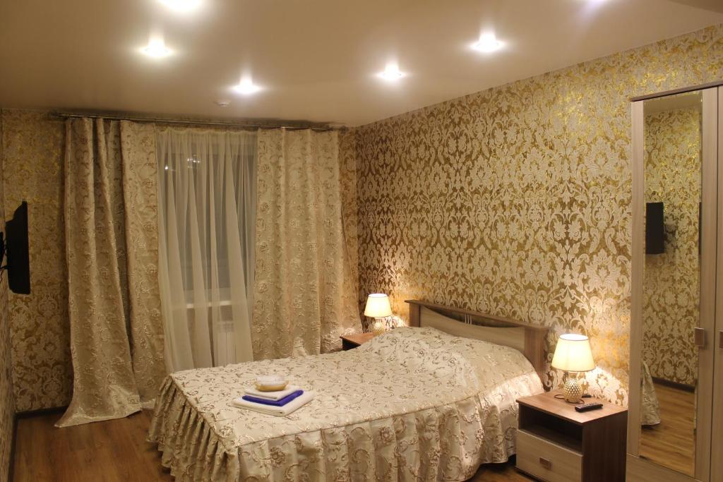 Кровать или кровати в номере Отель "Уралочка"