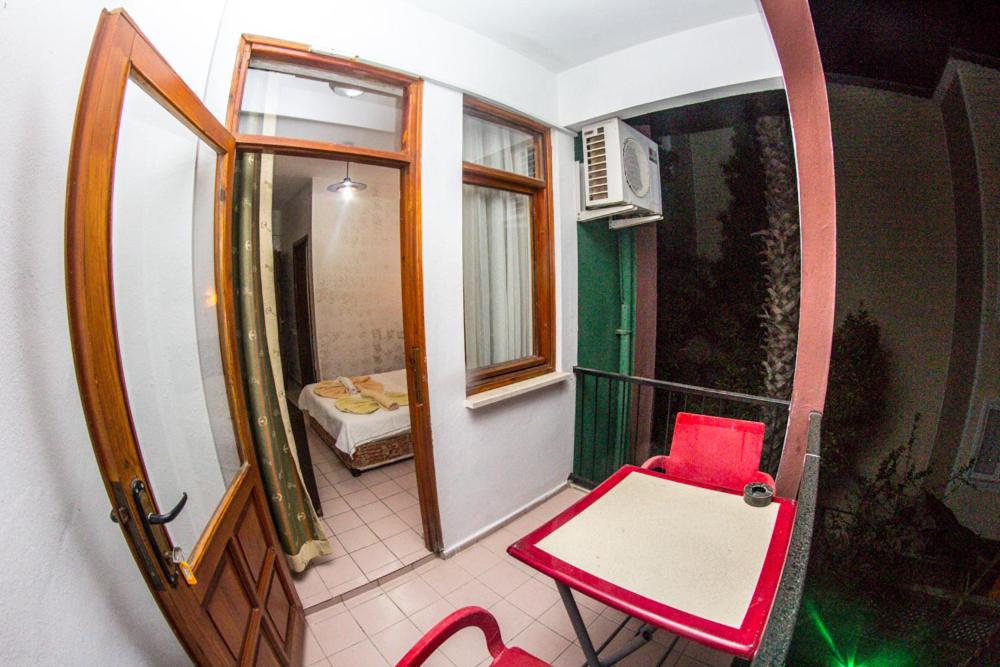Postel nebo postele na pokoji v ubytování Latino Hotel
