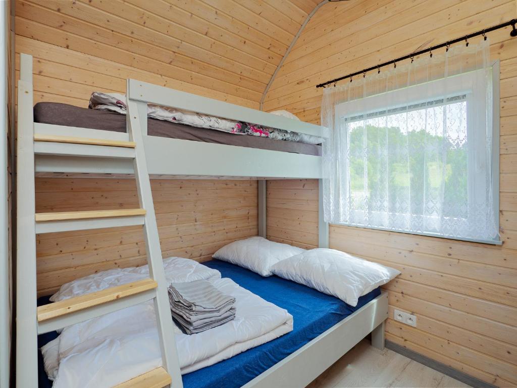 Postel nebo postele na pokoji v ubytování Domki Malibu