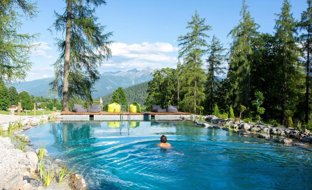 The swimming pool at or close to Naturhotel Lärchenhof