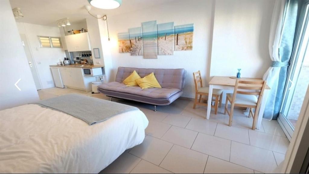 A bed or beds in a room at Brise Marine