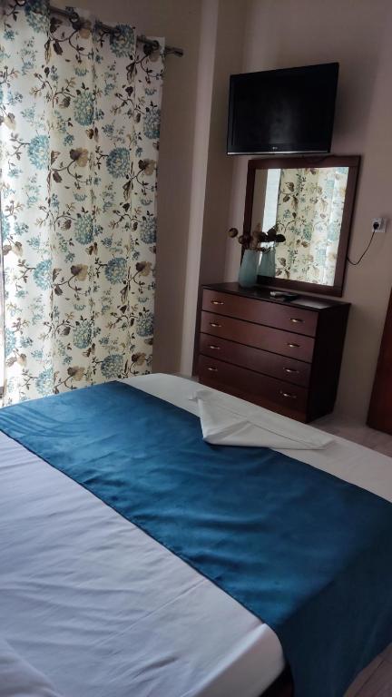 Postel nebo postele na pokoji v ubytování Sea View Apartments Poseidon