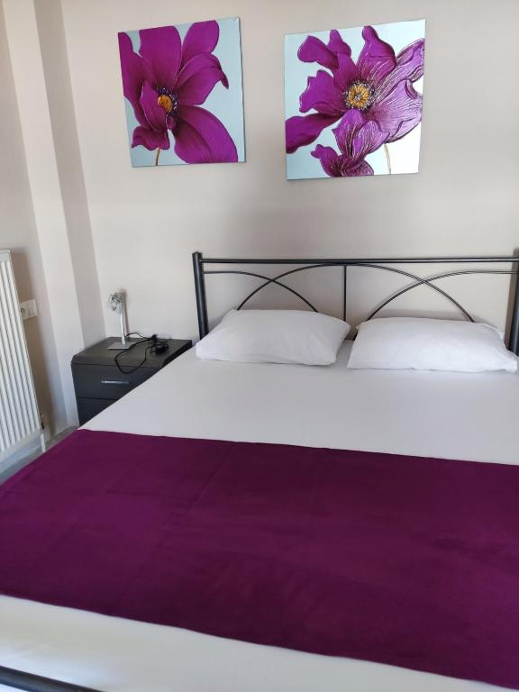 Postel nebo postele na pokoji v ubytování Sea View Apartments Poseidon