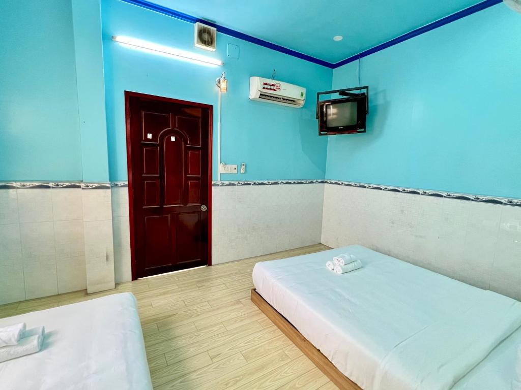 Postel nebo postele na pokoji v ubytování ARYE guest house