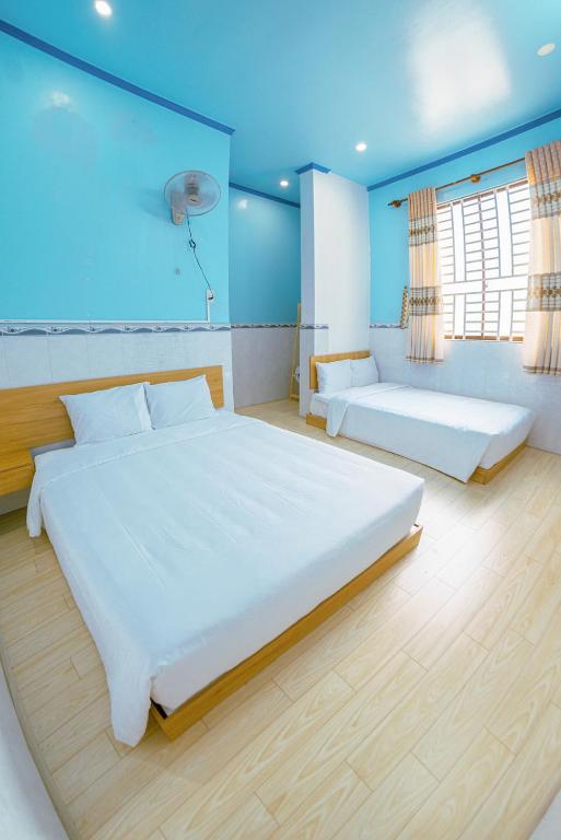 Postel nebo postele na pokoji v ubytování ARYE guest house